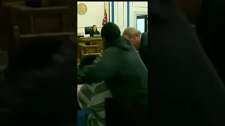 Father Punches Son's Killer in COURT