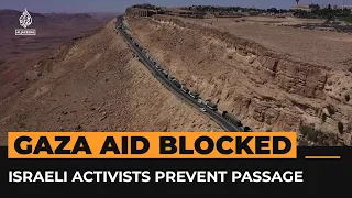 Israeli activists block Gaza-bound aid trucks on desert highway | AJ #Shorts