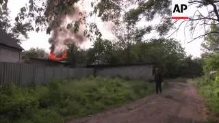 Heavy fighting between pro-Russian rebels and Ukrainian troops, injured, house on fire after shellin