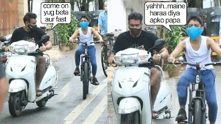See Ajay Devgan Encouraging Son Yug Devgan While Racing With Him On Mumbai Streets