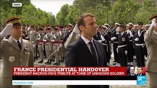 French President Emmanuel Macron pays homage to WWI Unknown Soldier at the Arc de Triomphe