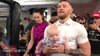 Conor McGregor walks in with his baby & girlfriend Dee Devlin dressed super sharp