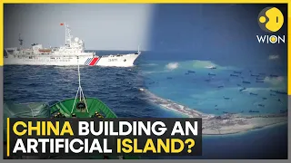South China Sea dispute: China denies Philippine report of 'artificial island' in disputed atoll