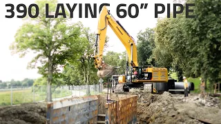 Laying 60" Pipe with a CAT 390