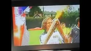 Streaker disrupts 2012 Olympic Torch Relay then gets arrested in Henley-on-Thames, England.