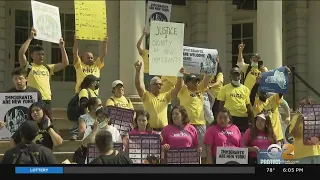 Rally outside City Hall for more aid for migrants bused to NYC