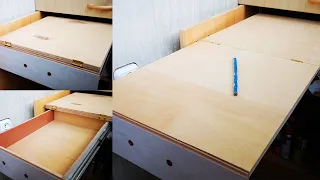 Pull-out folding table with built-in drawer