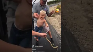 Kid holds snake and scares the crap out of everyone
