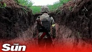 Ukrainian soldiers brace themselves in frontline trenches of Donetsk