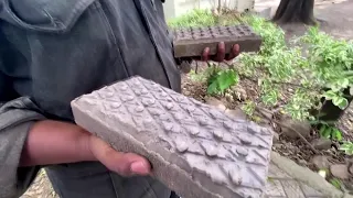 Paving the way: Kenyan recycles plastic into bricks