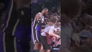 Lebron knocks down young lady and helps her up 😊 #shorts #viral #fyp #nba