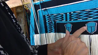Demonstration for turning a corner and weaving a ravenstail three strand twine.