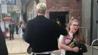 Machine Gun Kelly Touches Fan's Shoulder As He Walks By