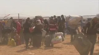 Escaping ISIS: Syrian refugees pack camps inside Turkey