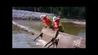 Des Moines Water Works Raises the Flash Boards Along Raccoon River