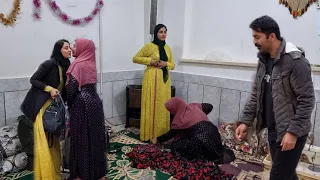 Cultural exchange: Hassan and Parisa with the twins' family | Sewing traditional clothes