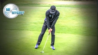 CHIPPING FROM A DOWNHILL LIE