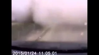 Driver's dashboard camera captures moment of Mariupol shelling