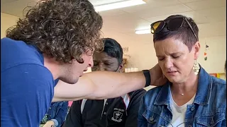 Women gets healed in the classroom during school