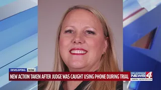 New action taken after judge was caught using phone during trial