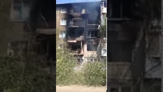 В Красногоровке в результате обстрела повреждены жилые дома, июль 2014 года