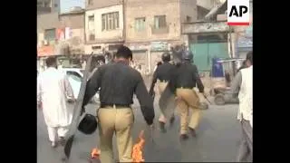 Police use batons and tear gas to disperse Bhutto supporters