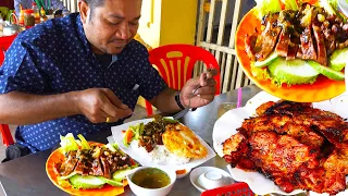 Mouthwatering street food, eating white rice with grilled pork and fried eggs, Cambodian street food