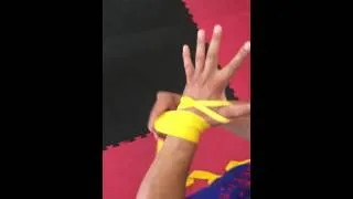 How to wrap your hands for boxing with Coach Nelson