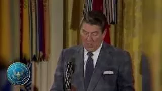 Reagan presents Presidential Citizens medal to Raymond Weeks and remarks to Veterans 11-11-82