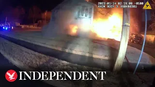 Moment house explodes with firefighters battling blaze still inside