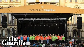 Choir lead Don't Look Back in Anger at mass singalong in Manchester
