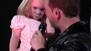 Johnny Reid dancing with his daughter, Ava