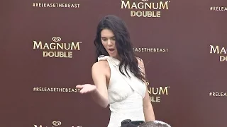 Kendall Jenner arrives at Magnum Beach and pose at Photocall