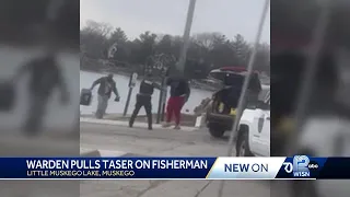 Warden pulls taser on fisherman