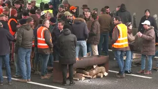 Watch again: French farmers on tractors block roads as protest approaches Paris