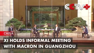 Xi Holds Informal Meeting with Macron in Guangzhou