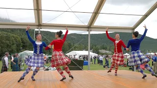 Scottish Champion Highland dancers compete in Reel of Tulloch during 2023 Ballater Highland Games