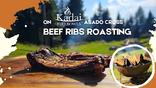 Beef  Ribs roasting on KADAI Firebowl asado cross