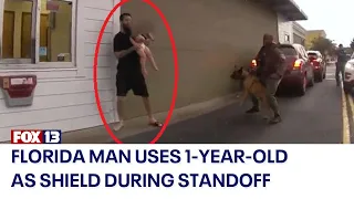 Video shows Florida man get tased while using 1-year-old as human shield during standoff with police