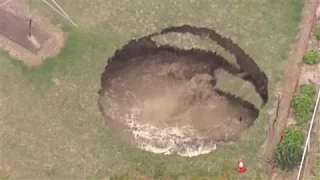 Giant Sinkhole Opens in Backyard