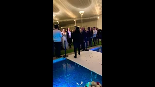 camera girl falls in water at wedding