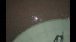 Orion setting behind ALMA PM02 antenna