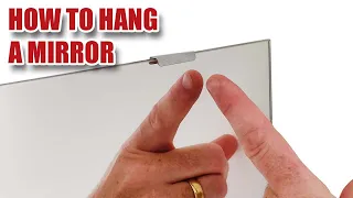 How to Hang a Mirror ...and a toothpaste tip?!?