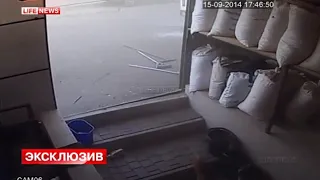 Камеры видеонаблюдения засняли обстрел мирных районов Донецка