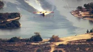 Watch: Calif. wildfire water bombers take on thousands of gallons in seconds
