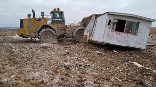 Joe crushing a mobile home