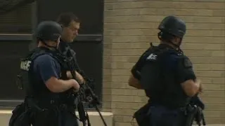 SWAT team surrounds Dallas parking garage
