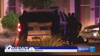 9 officers hurt, suspect and woman dead after shootout at Phoenix home