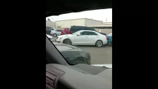 Old man trying to get out of a tight parking spot