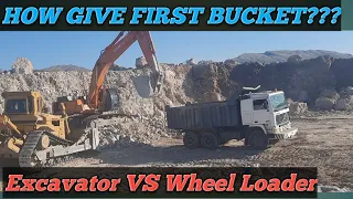 How to load dumper truck  with Excavator and wheel loader start first Bucket.quarry Heavy Machinery.